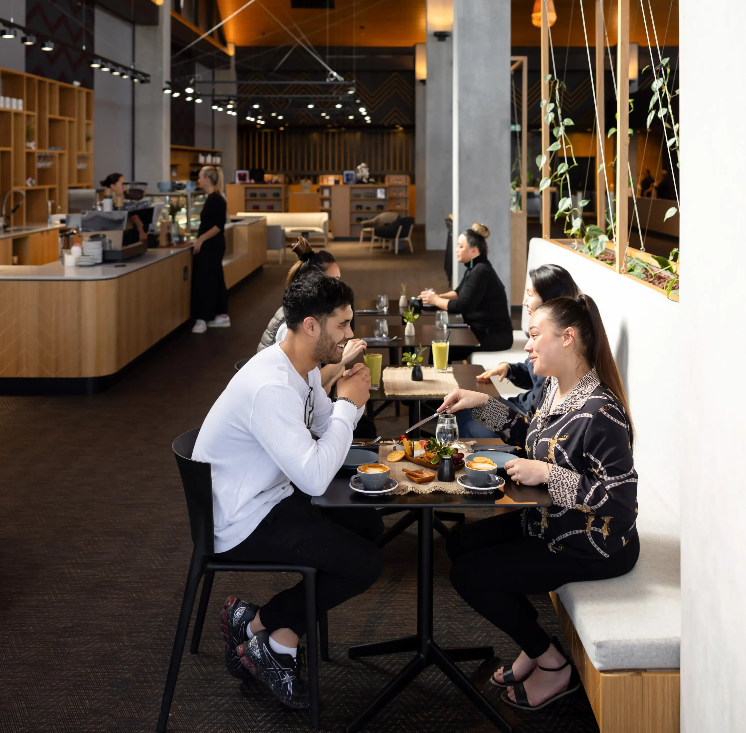 Couple dining at Te Rourou cafe at Wai Ariki Hot Springs and Spa