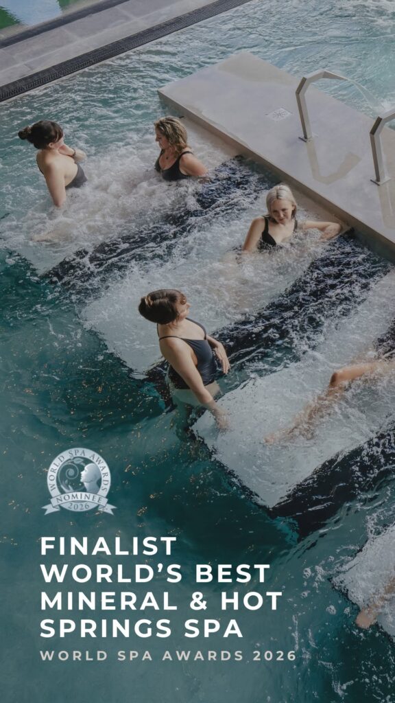 Guests relaxing in geothermal mineral pools at Wai Ariki Hot Springs & Spa, finalist for World's Best Mineral & Hot Springs Spa at the World Spa Awards 2026.