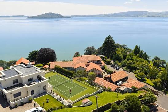 Aerial view of On The Point beside Lake Rotorua, looking towards Mokoia Island.
